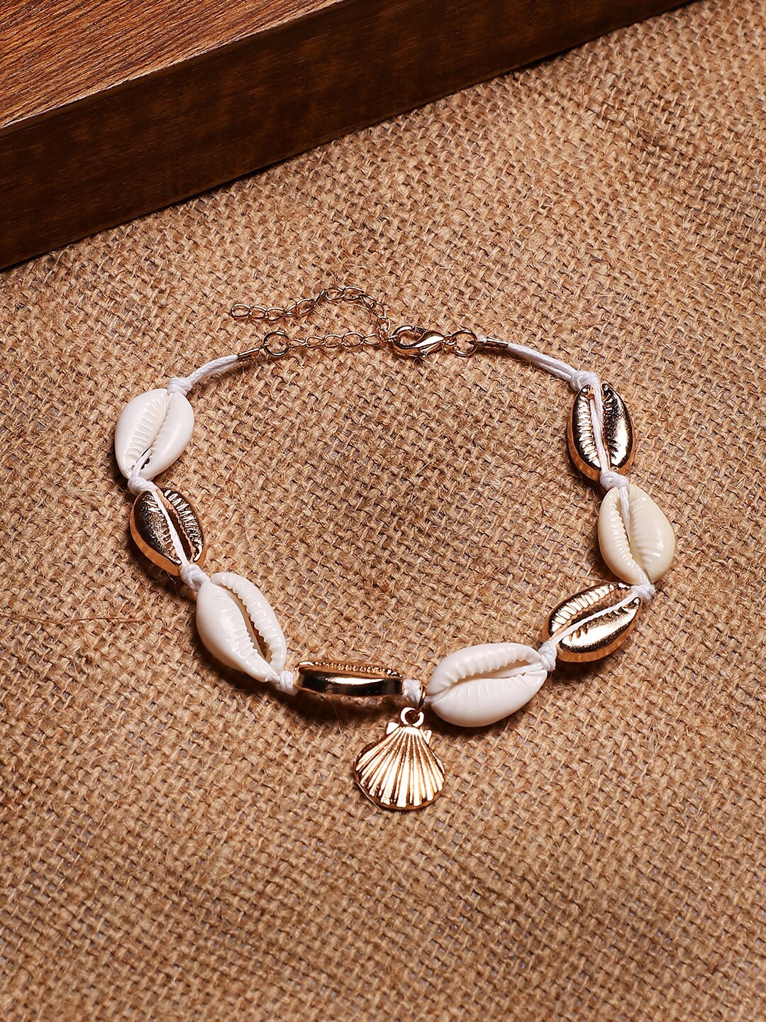 

Sangria Gold-Plated Shell Beaded Anklet Cum Bracelet