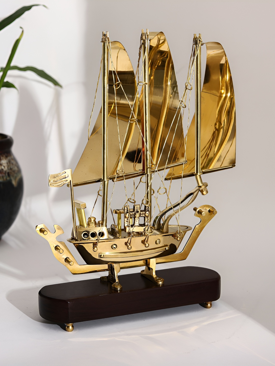 

Chokhi Dhani Kalagram Gold Toned Pirate Ship Sculpture Showpiece