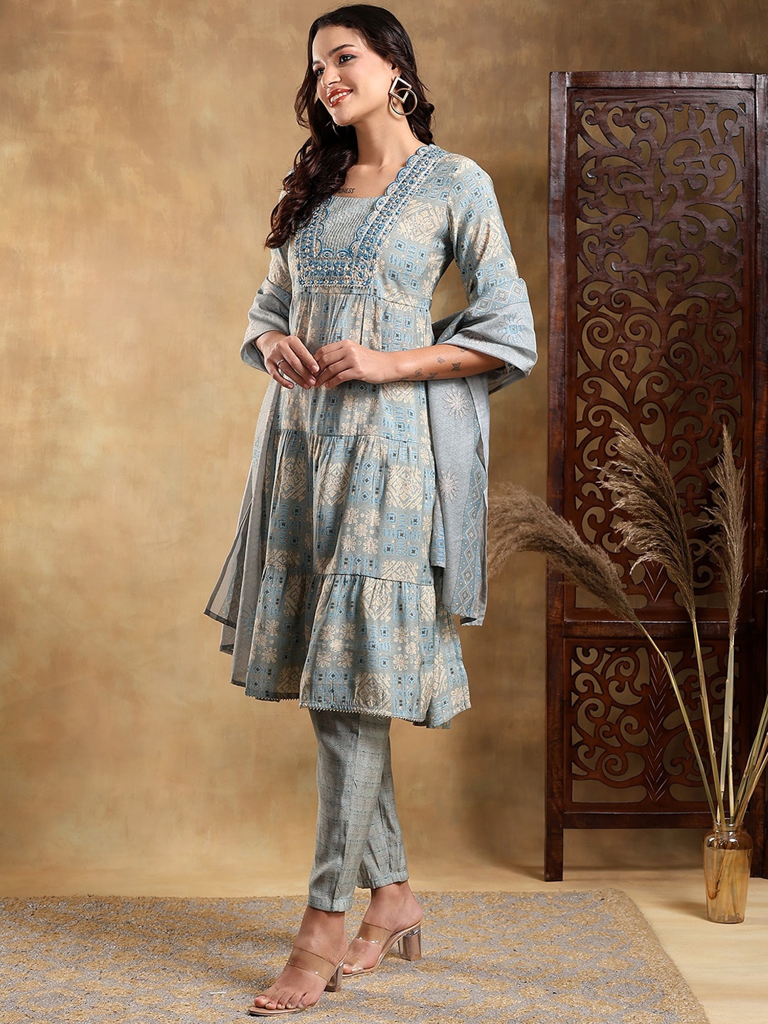 

Bani Women Blue Ethnic Motifs Mirror Work Pleated A Line Kurta with Trousers & Dupatta
