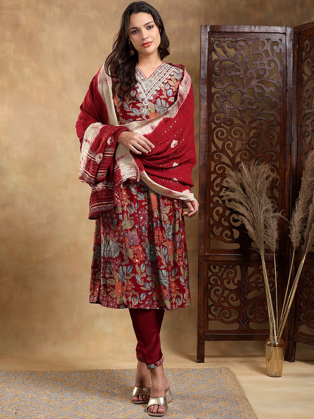 

Bani Women Floral Printed Embroidered Pleated Kurta With Trouser & Dupatta, Maroon