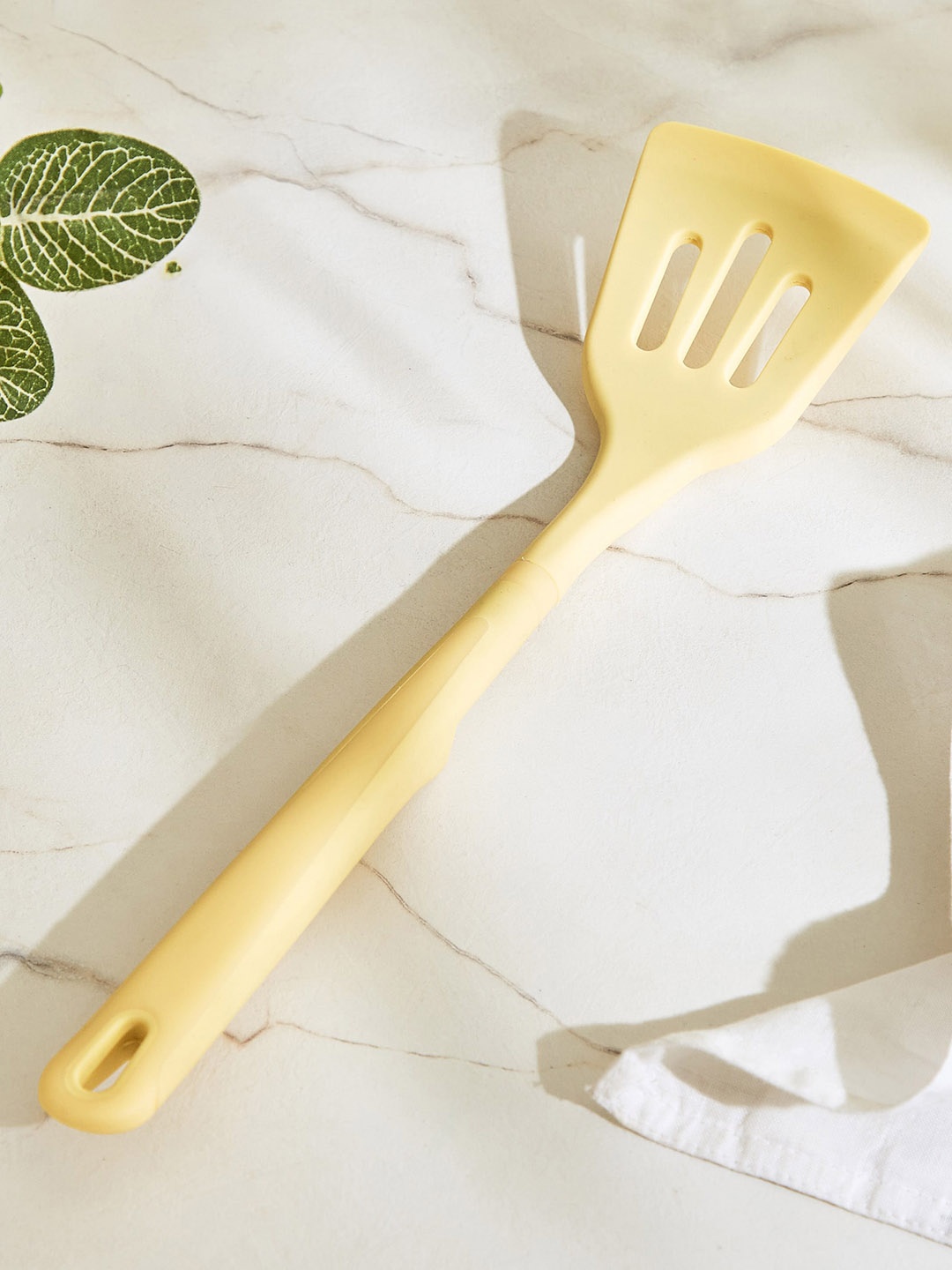 

Home Centre Yellow Textured Silicone Slotted Turner