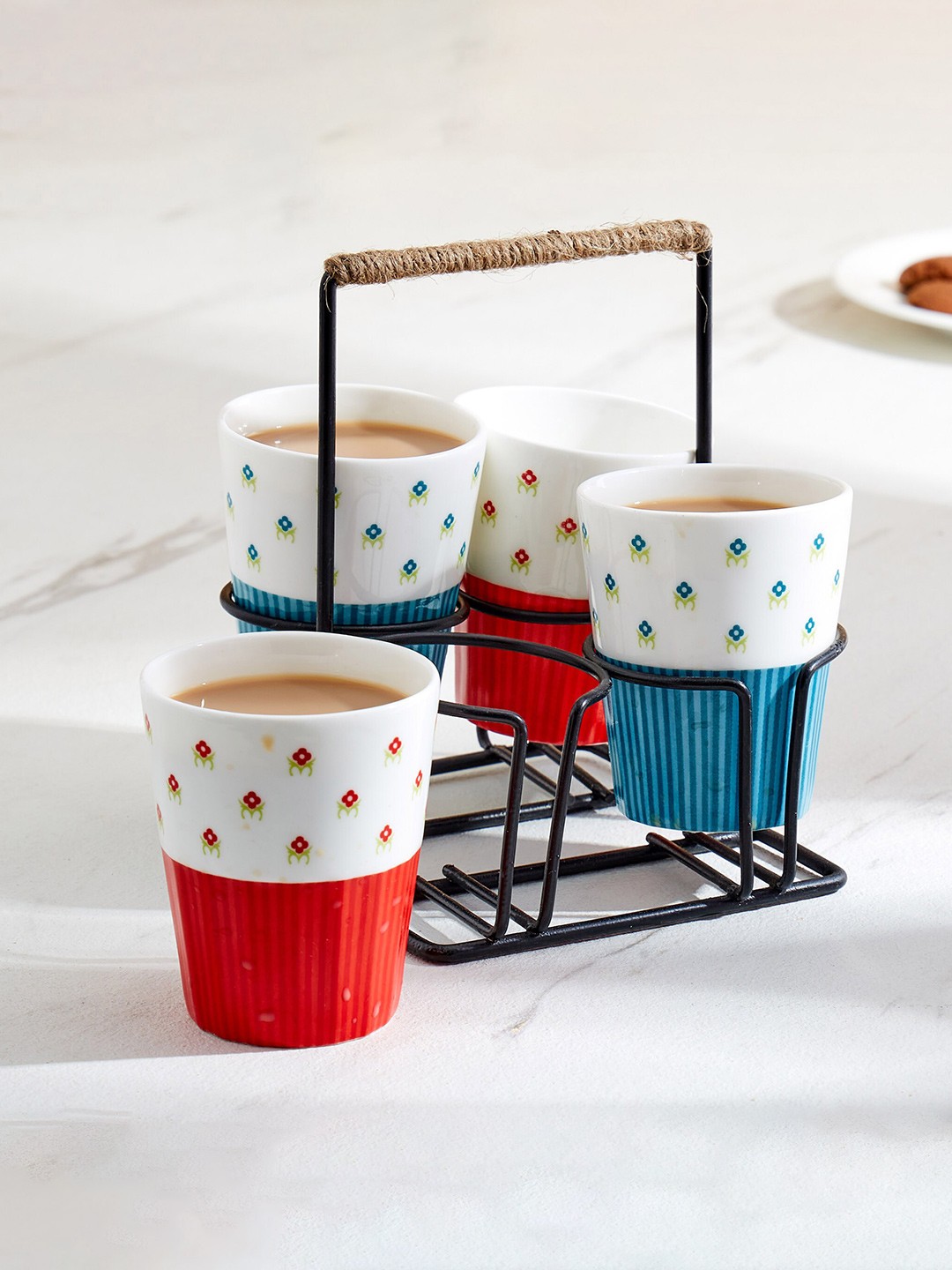 

Home Centre White and Blue 5 Pieces Printed Bone China Cups and Mugs