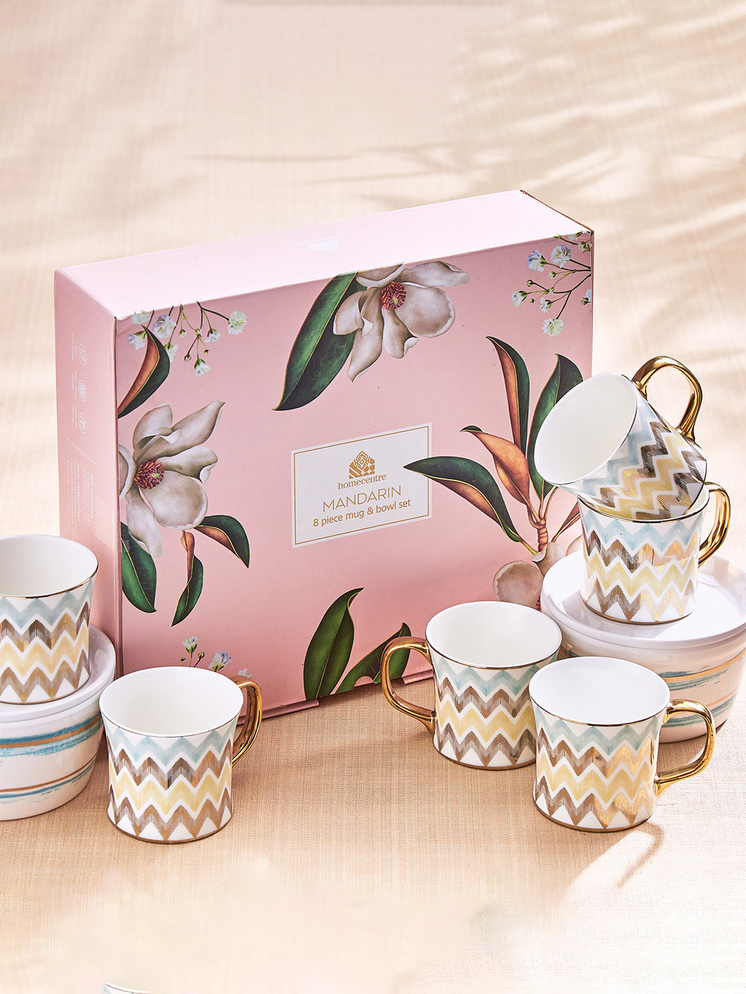 

Home Centre Mandarin Iris White & Beige 8 Pieces Printed Bone China Mugs and Bowls