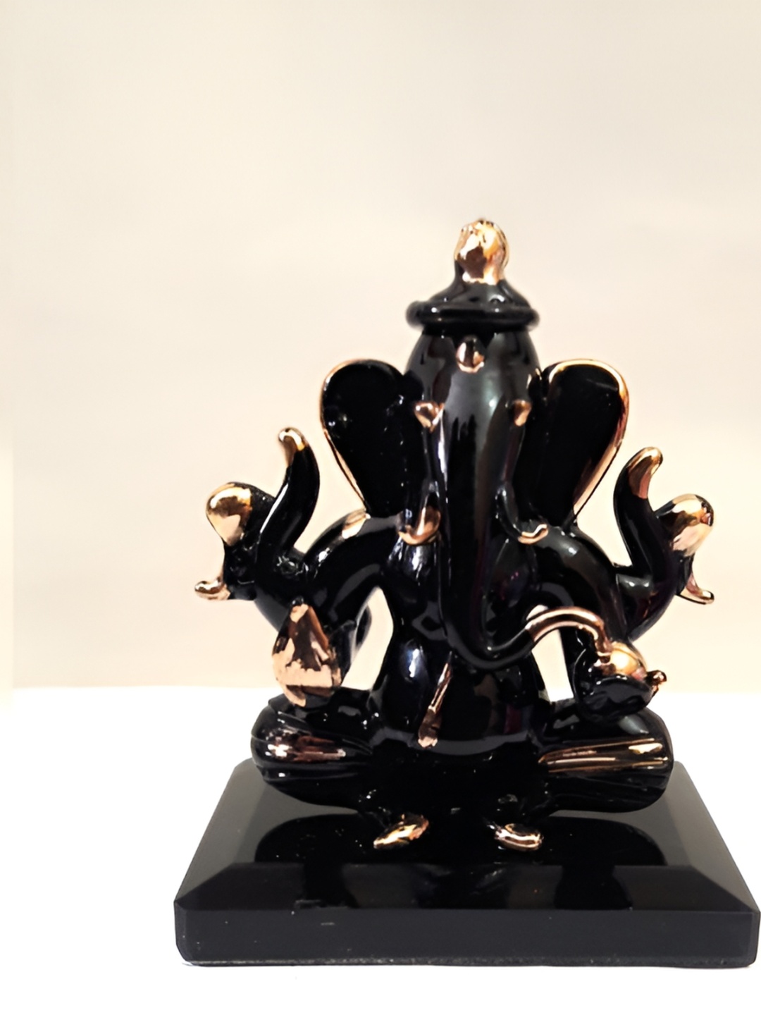 

Afast Black & Gold toned Glass Religious Idol Showpiece