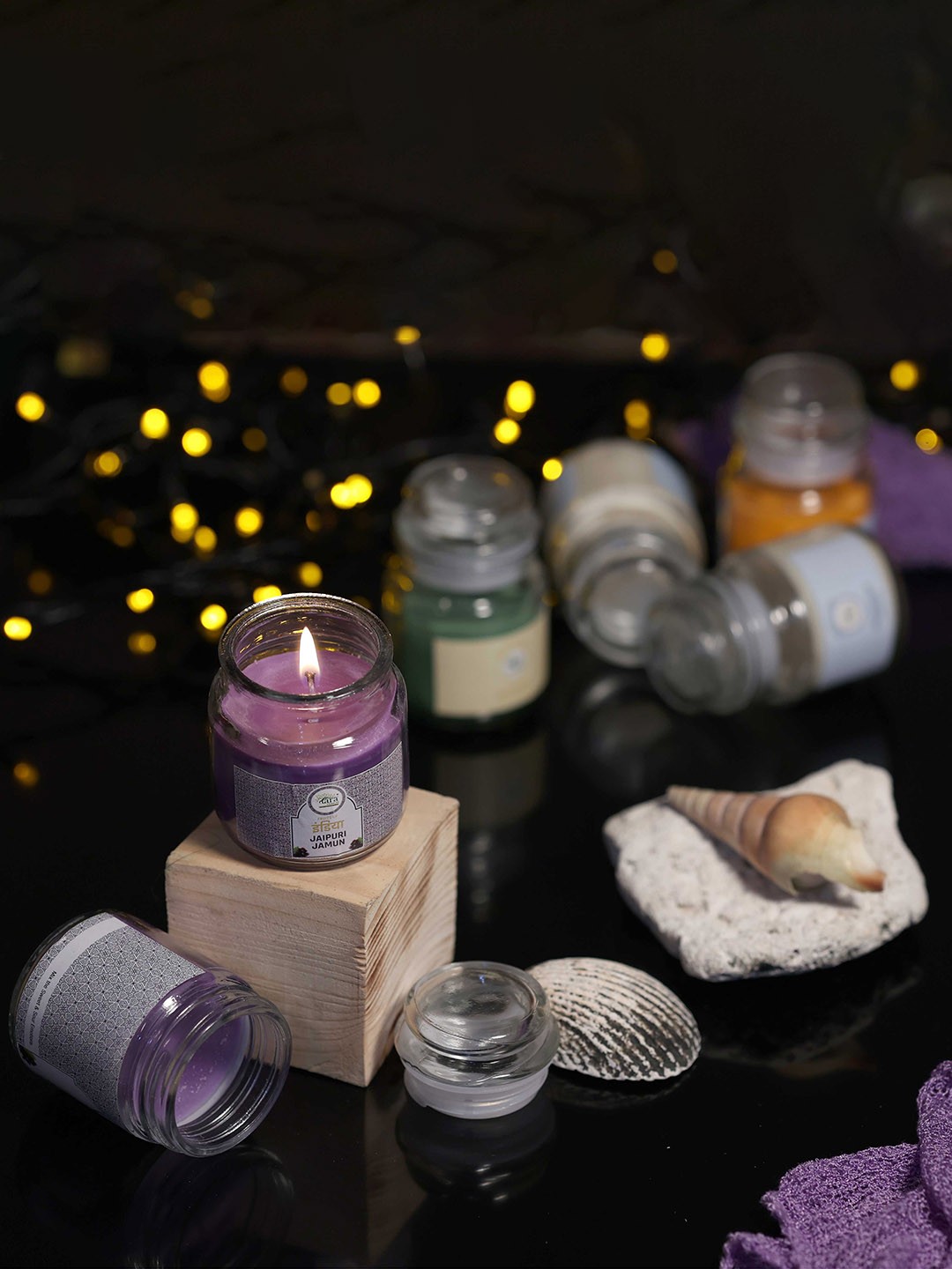 

Tara Enlightening World Jaipuri Jamun Irish Glass Container Candle, Purple