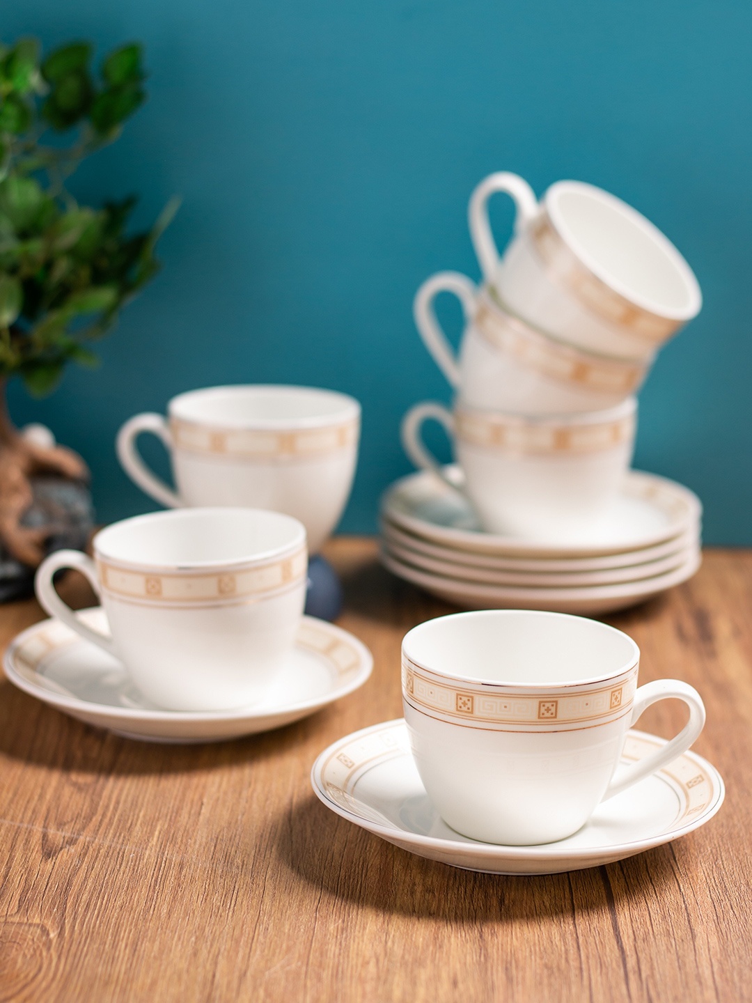 

CLAY CRAFT White & Beige 12 Pieces Printed Ceramic Glossy Cups & Saucers Set 180 ml