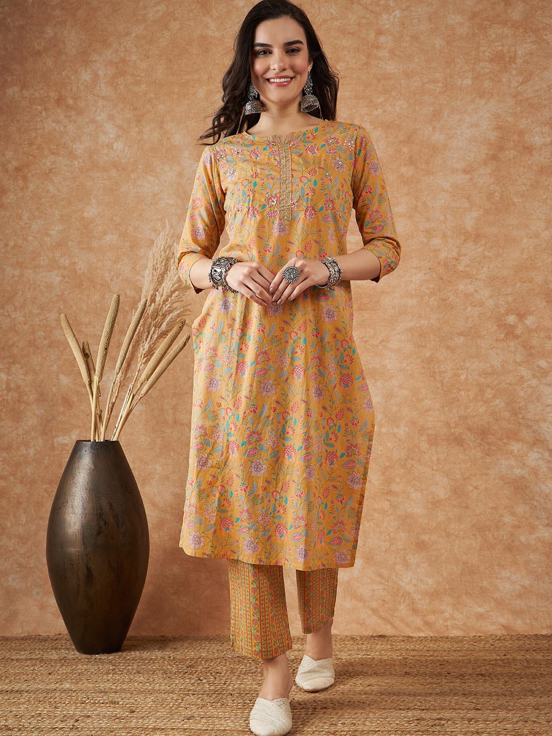 

Sangria Mustard Printed & Embroidered Pure Cotton Straight Kurta With Trousers