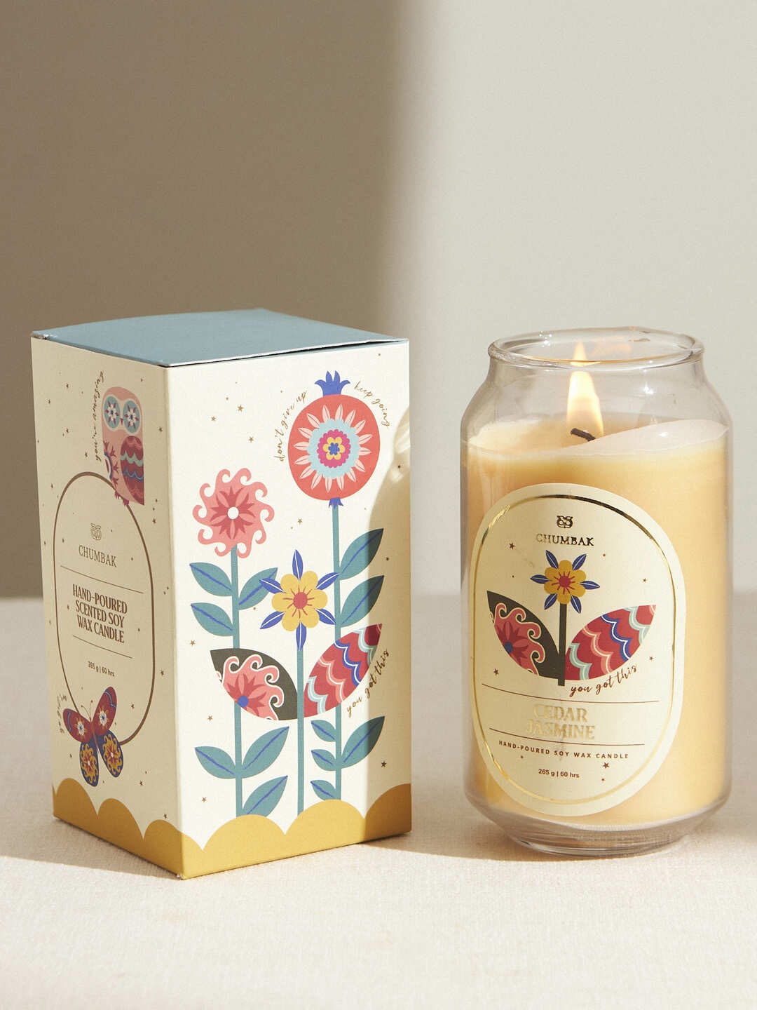 

Chumbak Orange & Green Printed Jar Candle