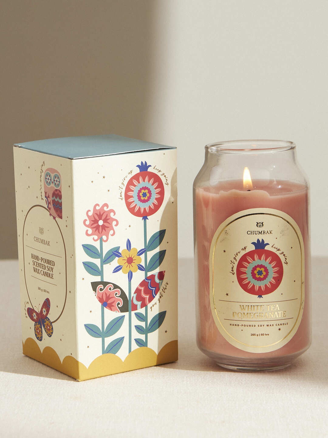 

Chumbak Orange & White Tea & Pomegranate Scented Jar Candle
