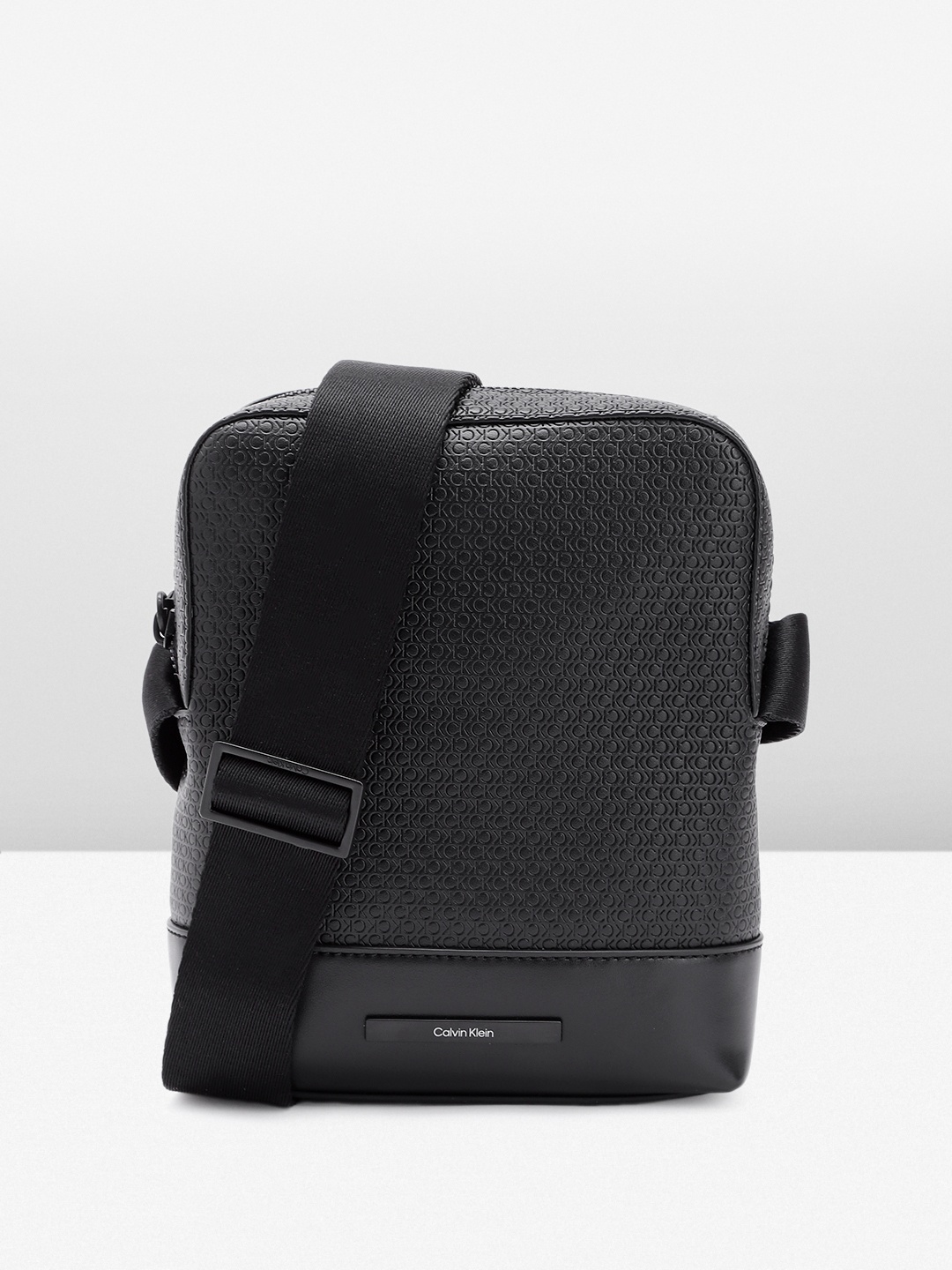 

Calvin Klein Men Textured Messenger Bag, Black