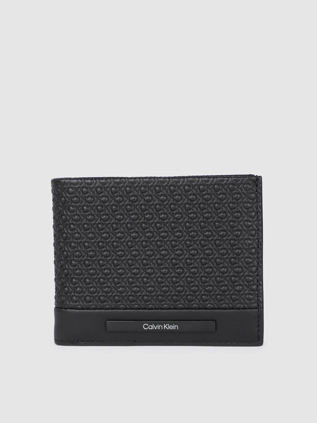 

Calvin Klein Men Textured Leather Two Fold Wallet, Black