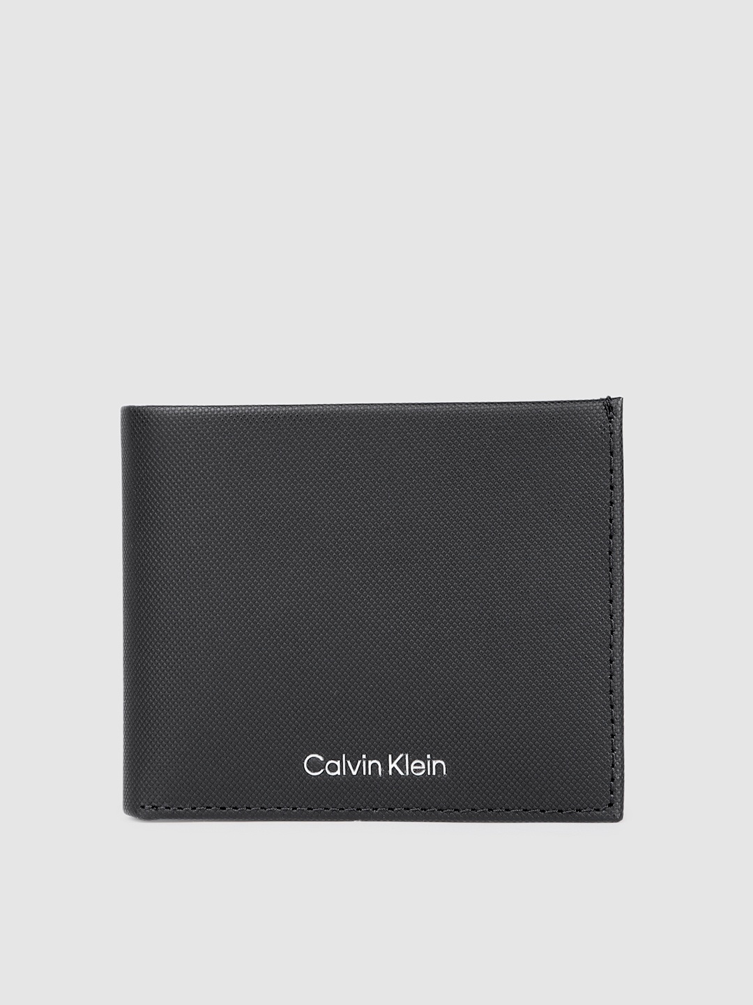 

Calvin Klein Men Leather Two Fold Wallet, Black