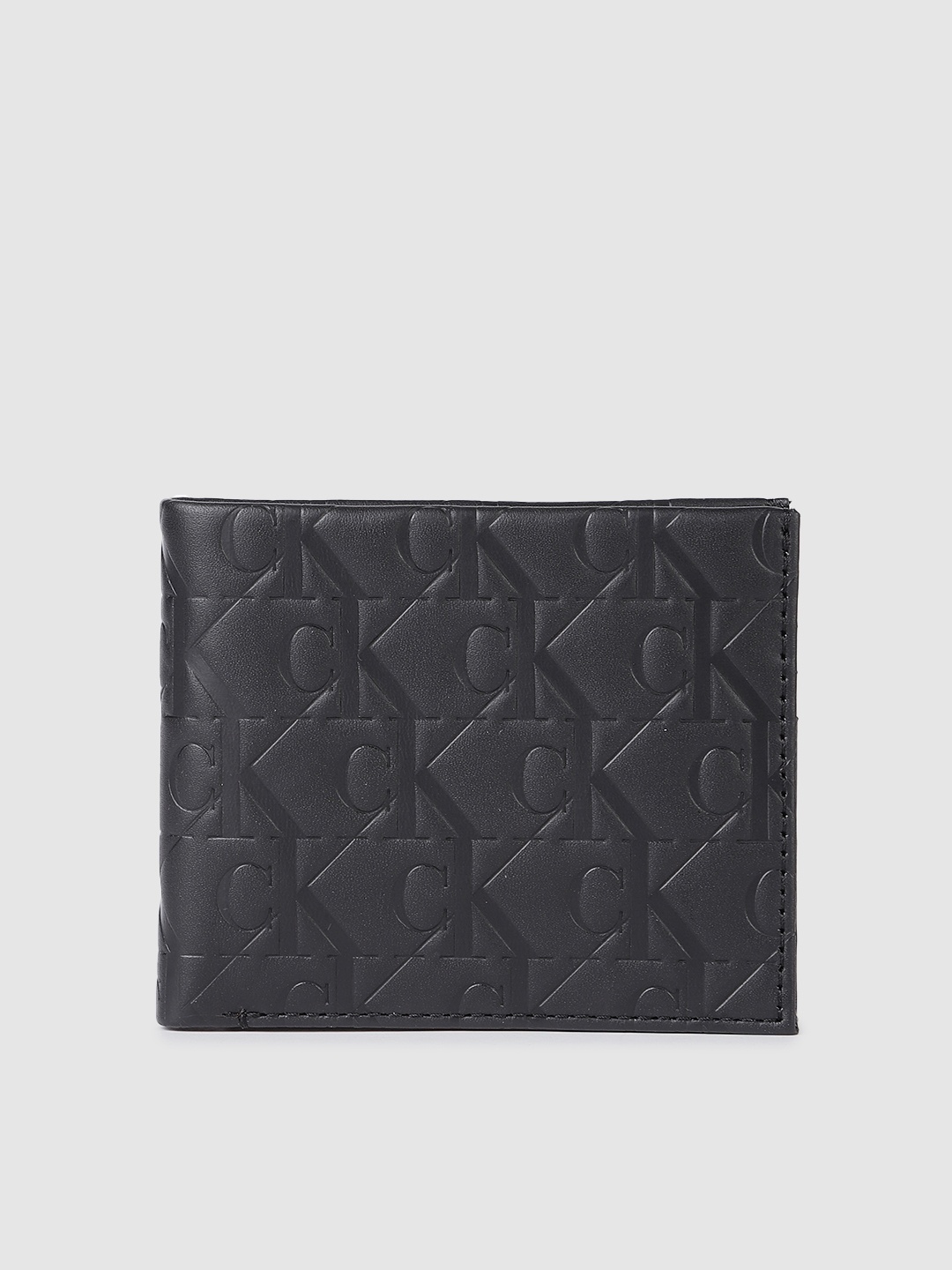 

Calvin Klein Men Textured Leather Two Fold Wallet, Black