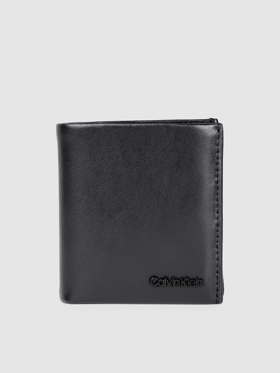 

Calvin Klein Men Leather Three Fold Wallet, Black