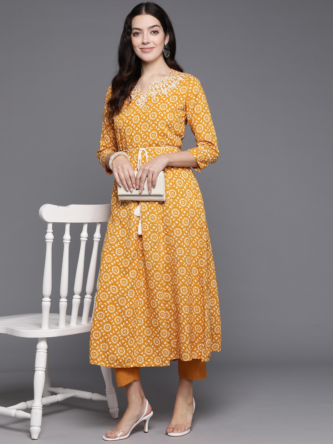 

Indo Era Women Ethnic Motifs Printed Thread Work A-Line Kurta, Mustard