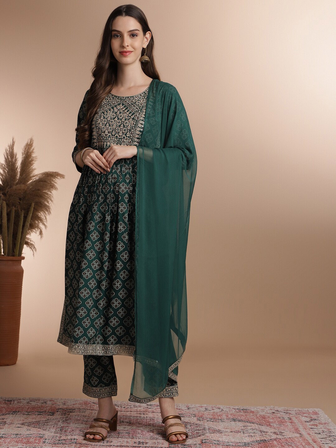 

Anouk Teal Ethnic Motifs Printed Thread Work Detail A-Line Kurta & Trouser With Dupatta