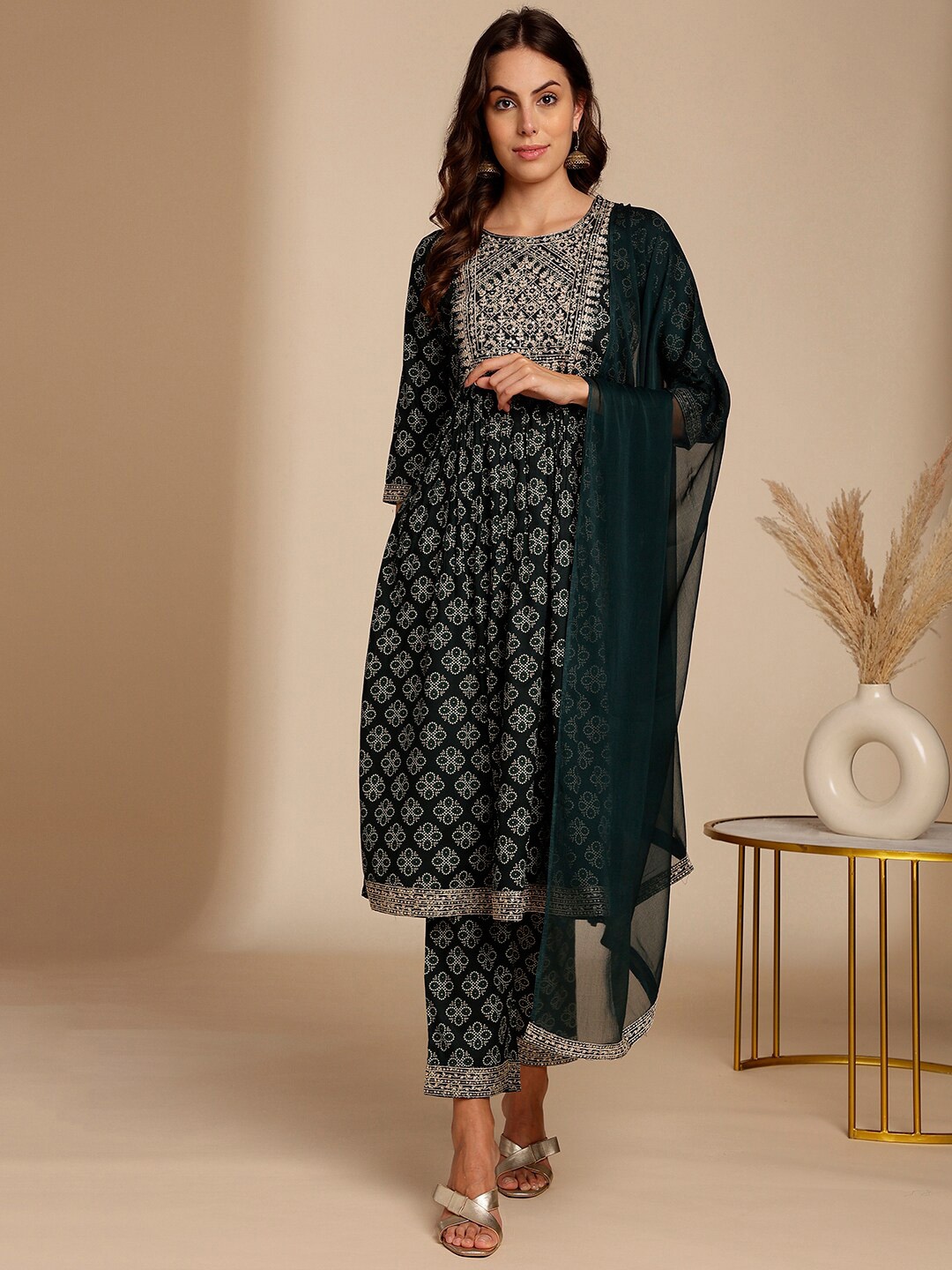 

Anouk Teal Ethnic Motifs Printed Thread Work Detail A-Line Kurta & Trouser With Dupatta