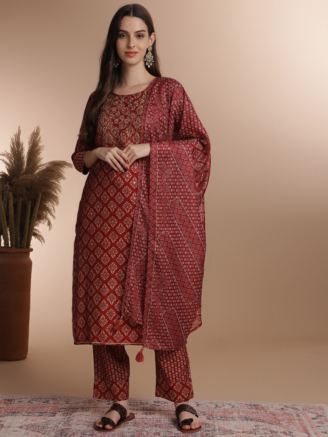 

Anouk Red Ethnic Motifs Printed Thread Work Detail Straight Kurta & Trouser With Dupatta