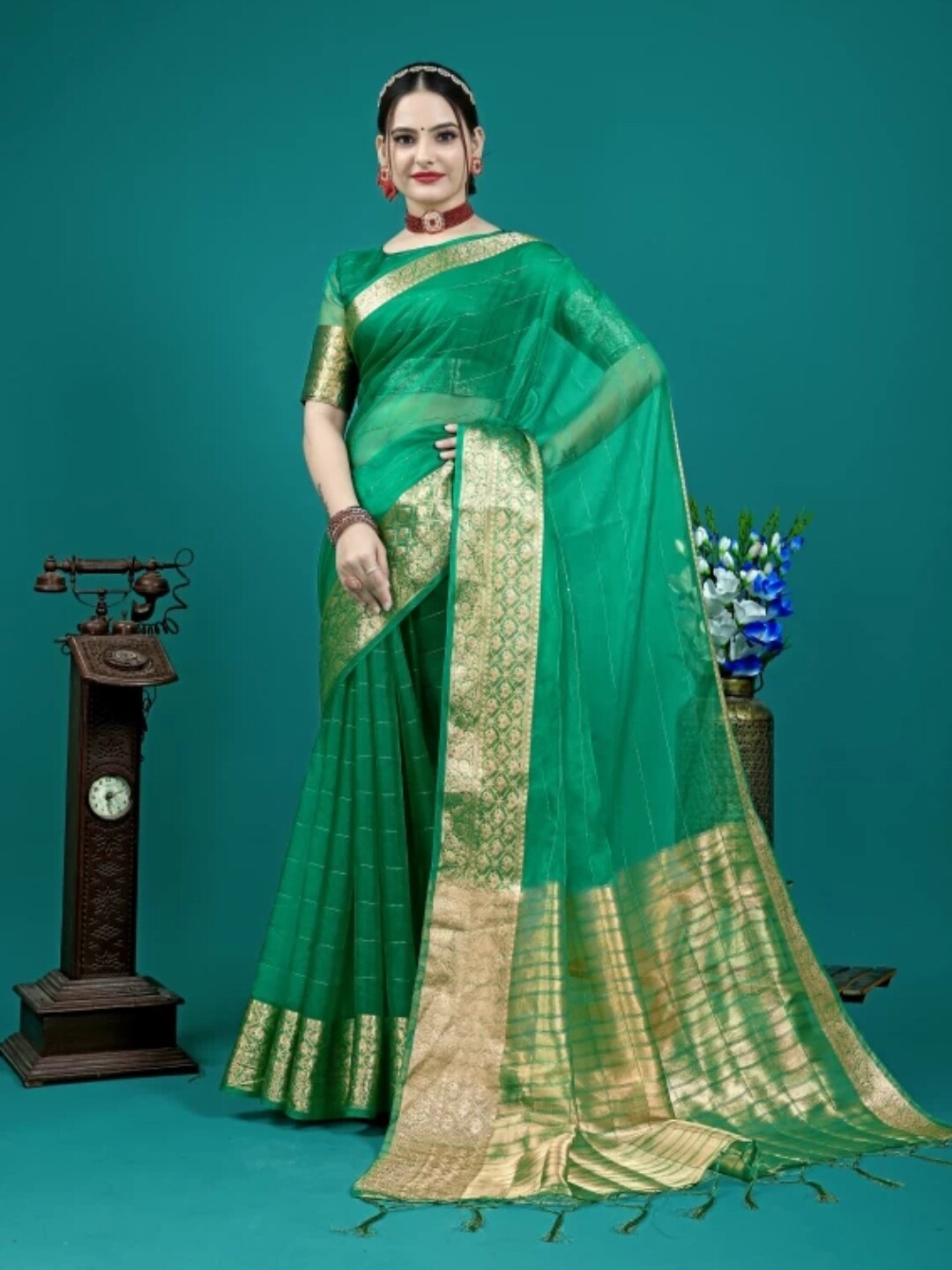 

Banaras silk palace Green Striped Sequinned Organza Banarasi Saree
