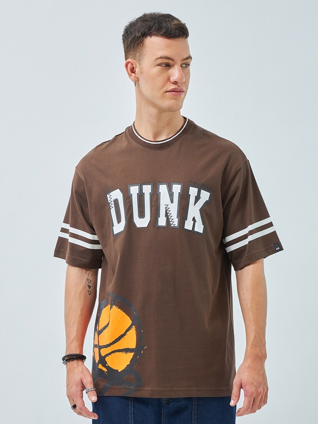 

Bewakoof Brown Dunk Graphic Printed Oversized Drop Shoulder Sleeves Pure Cotton T-shirt