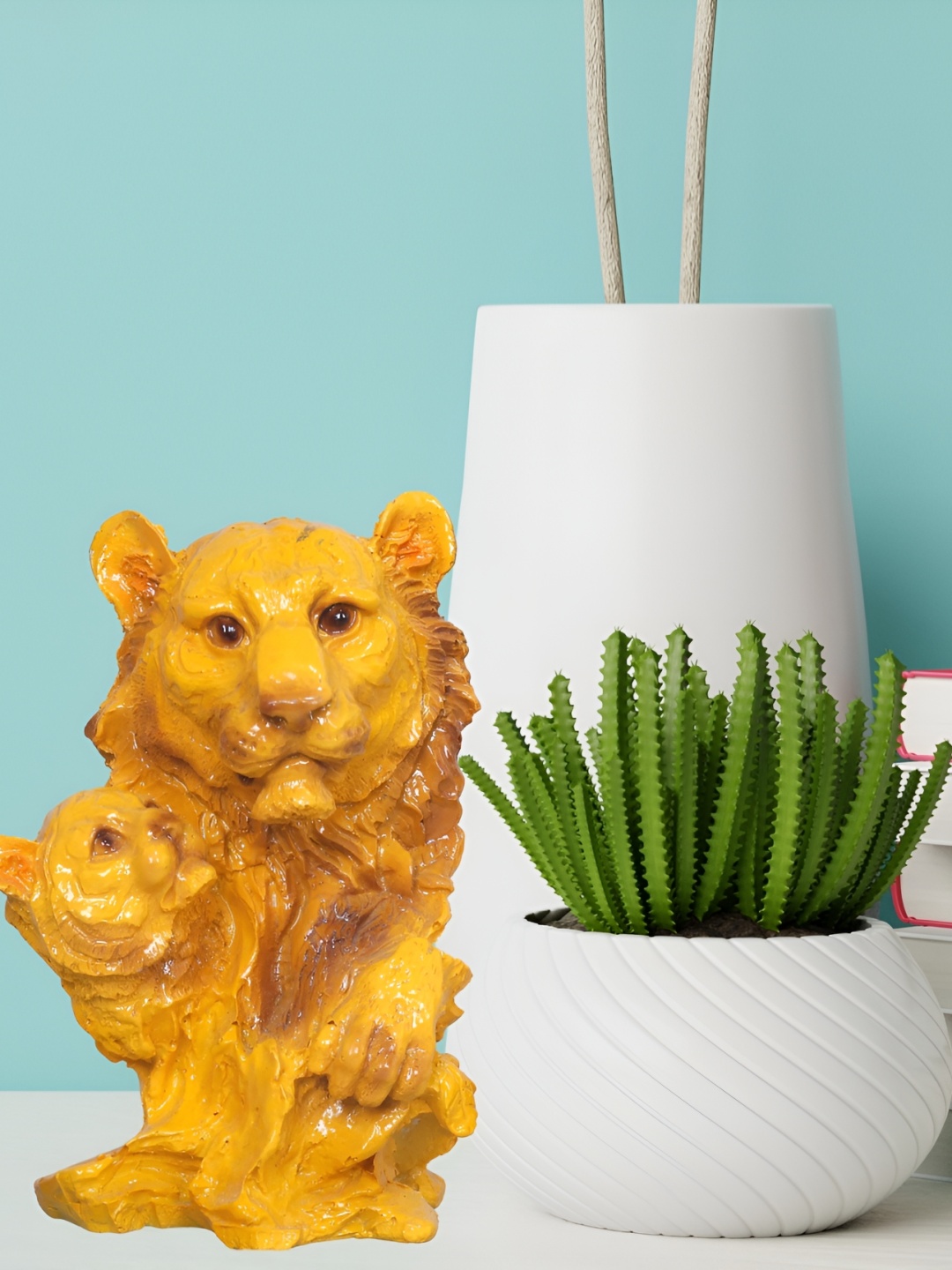

GW CREATIONS Yellow Figurine Showpiece