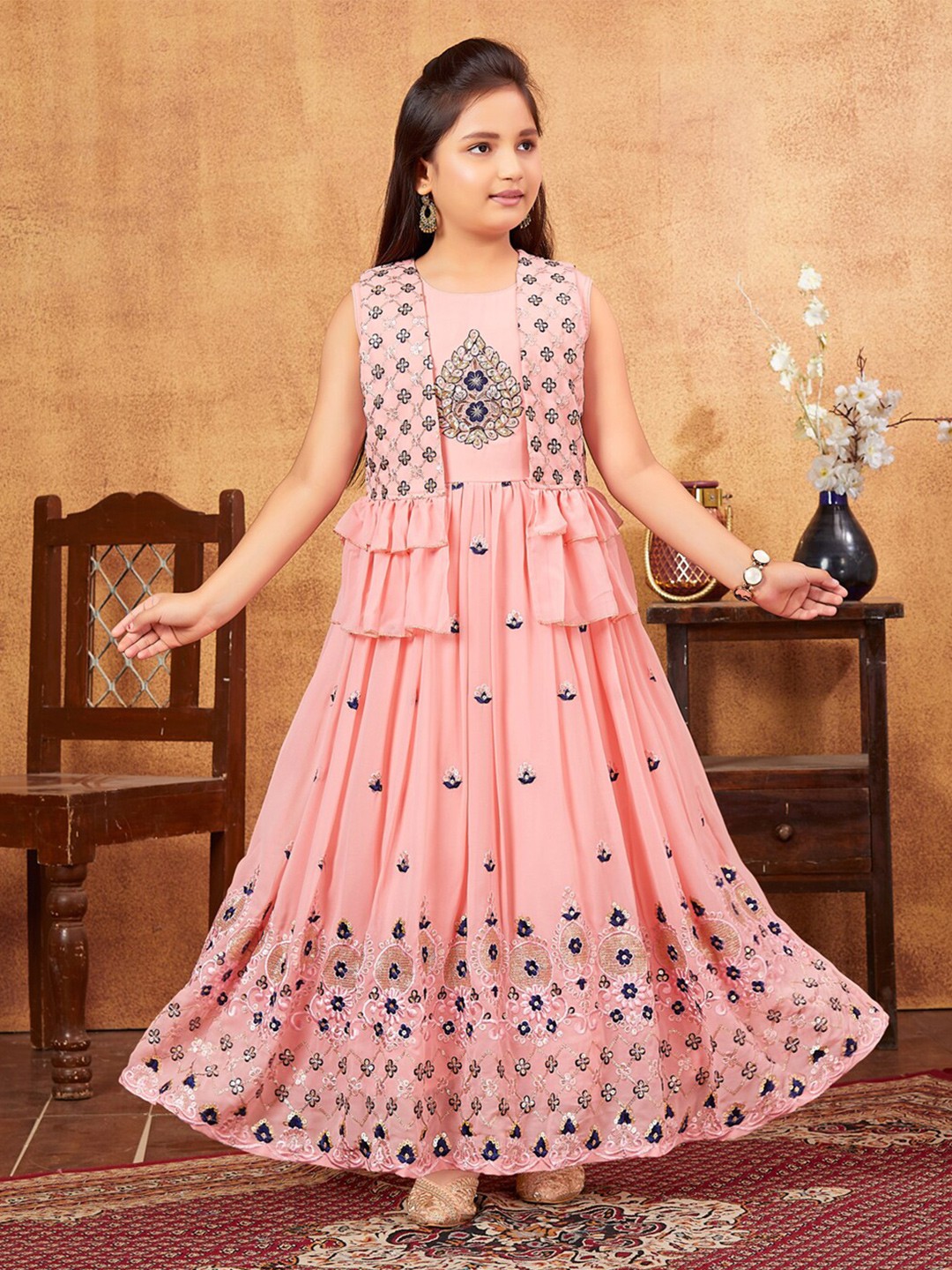 

Aarika Girls Floral Embroidered Sequinned Georgette Fit & Flare Maxi Ethnic Dress & Shrug, Peach