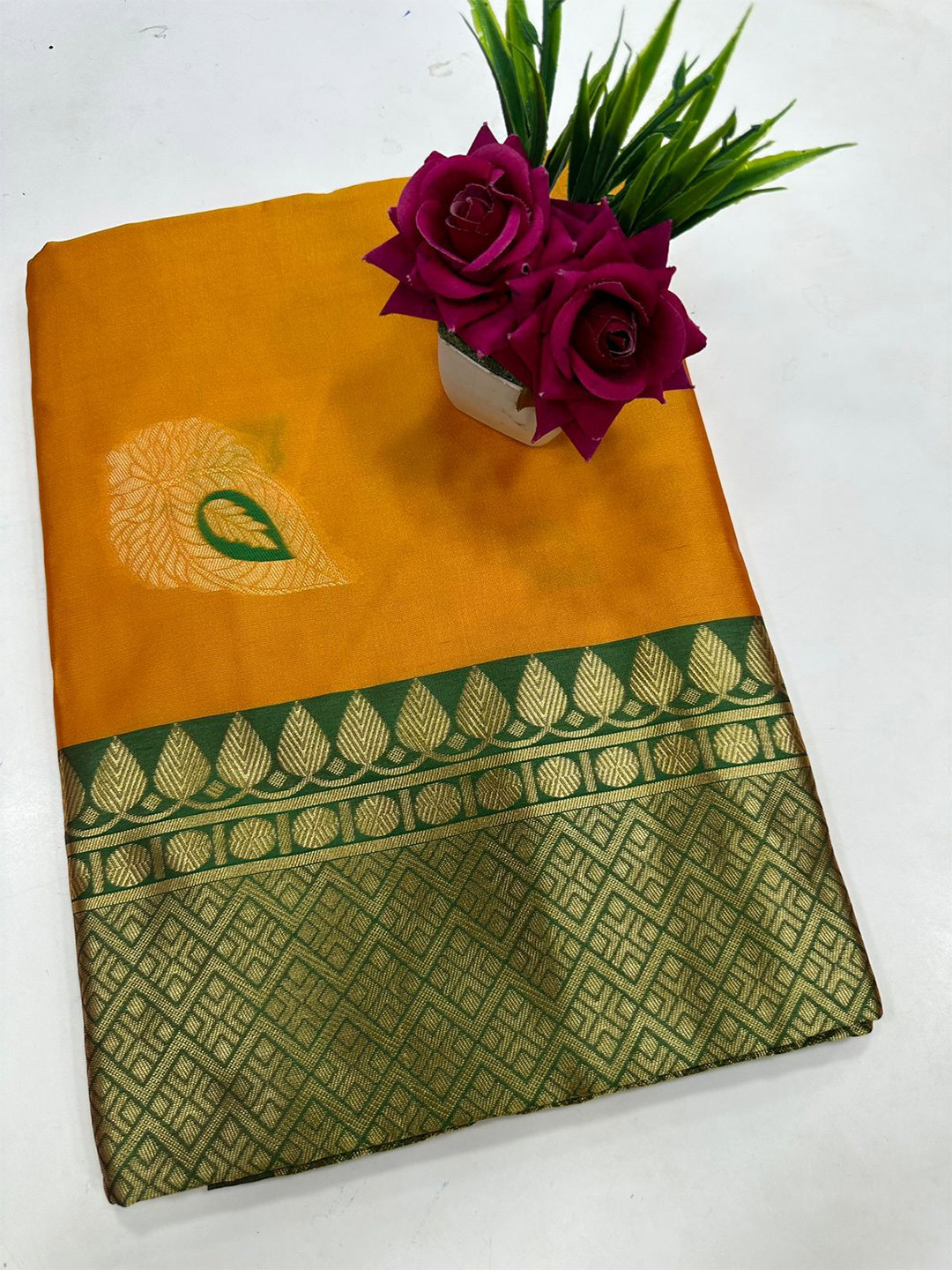 

APNISHA Ethnic Motifs Woven Design Zari Banarasi Saree, Yellow