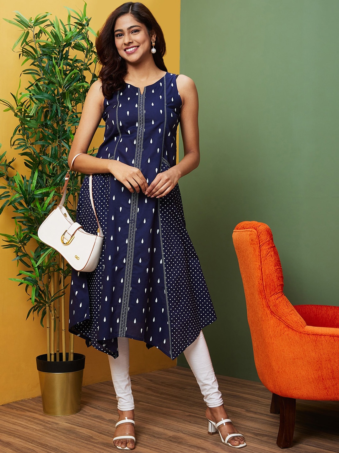 

Globus Polka Dot Asymmetric Hem Panelled Fusion A-Line Kurta, Blue