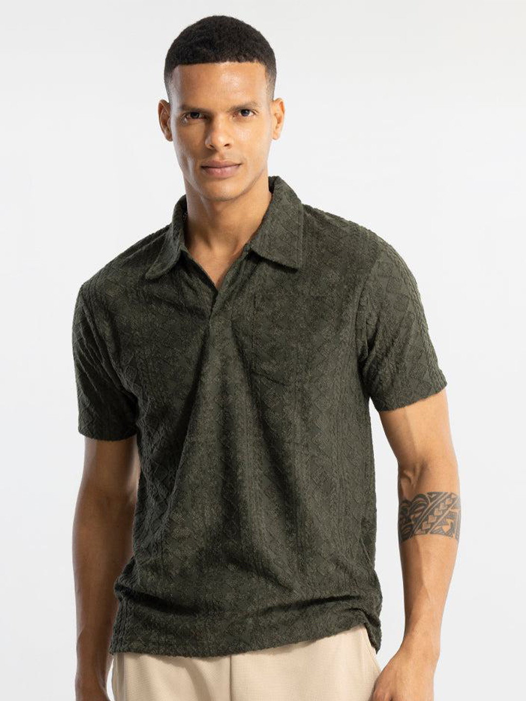 

Snitch Olive Green Geometric Self Design Polo Collar Cotton T-shirt