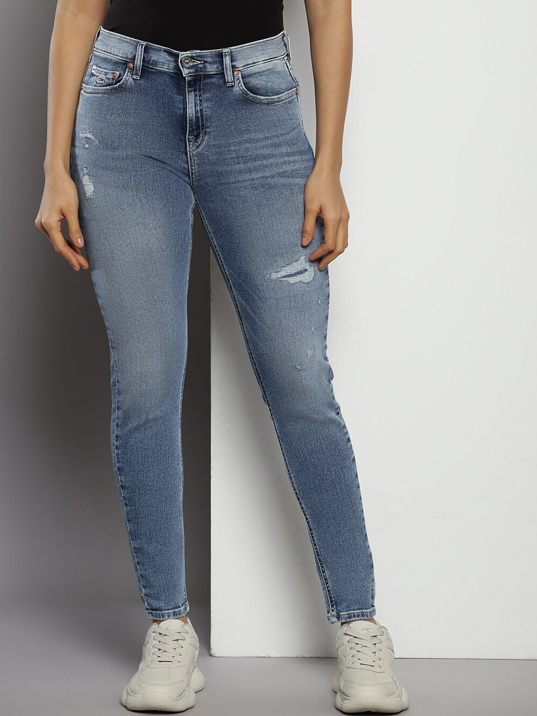 

Tommy Hilfiger Women Skinny Fit Low Distress Light Fade Cotton Jeans, Blue