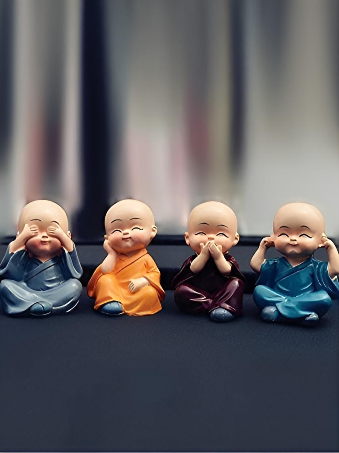 

SANKALAN CREATIONS Beige & Blue 4 Pcs Figurine Showpiece