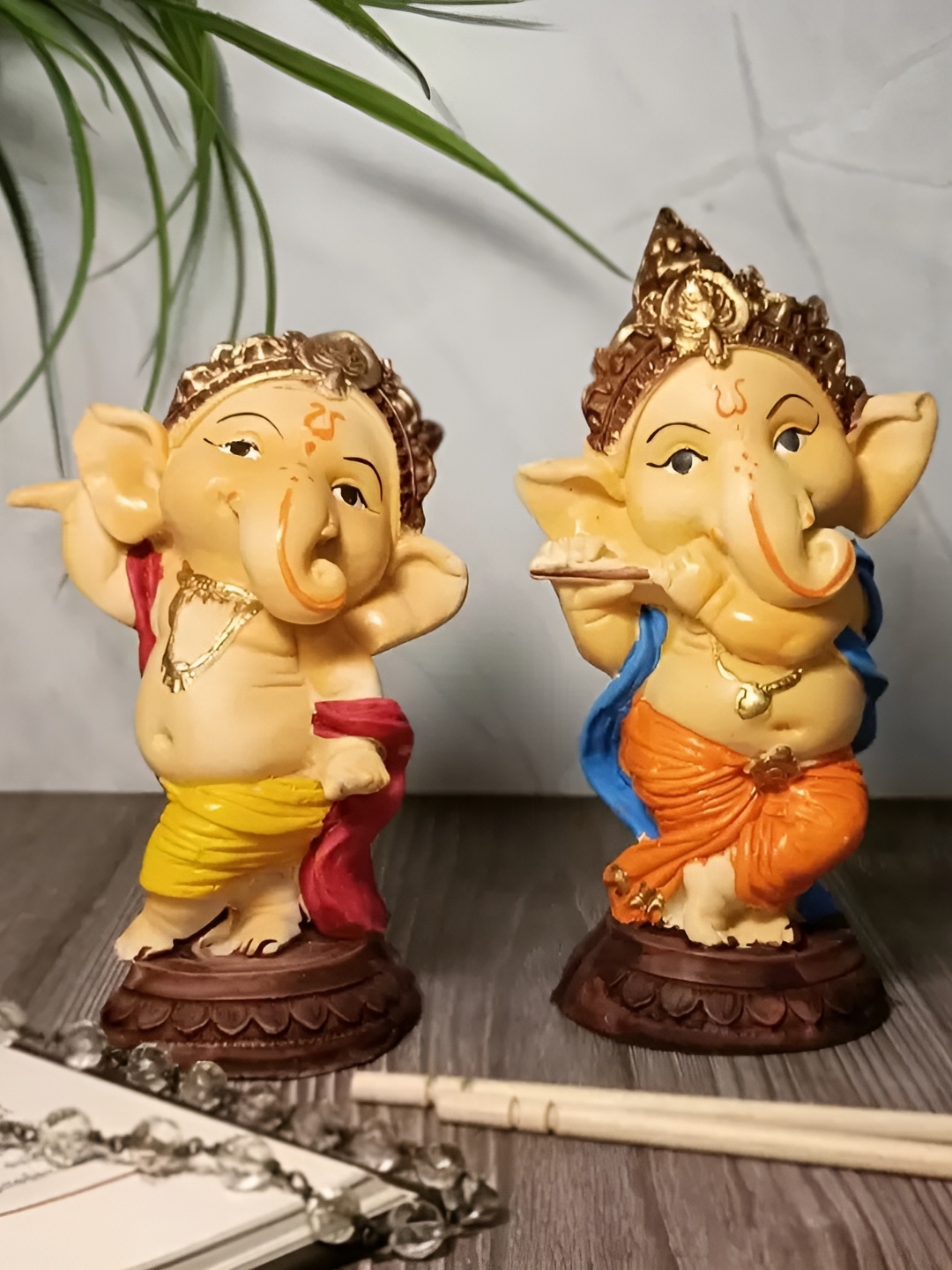 

SANKALAN CREATIONS Beige & Yellow Religious Idol Showpiece