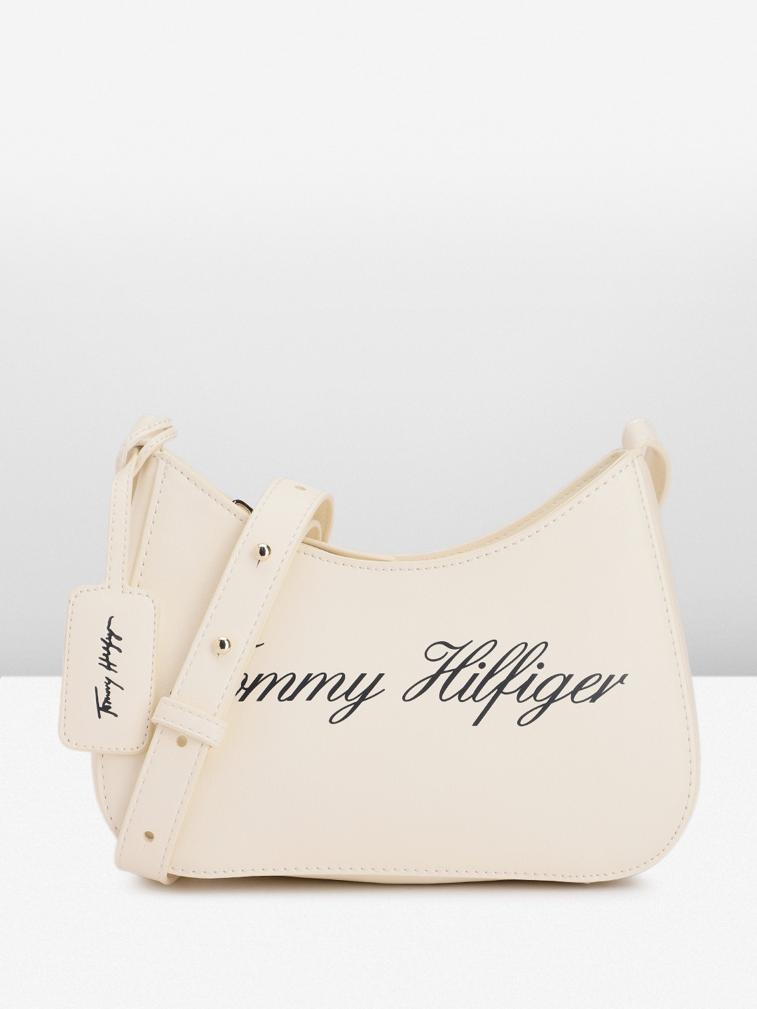 

Tommy Hilfiger Brand Logo Printed Structured Sling Bag, Off white