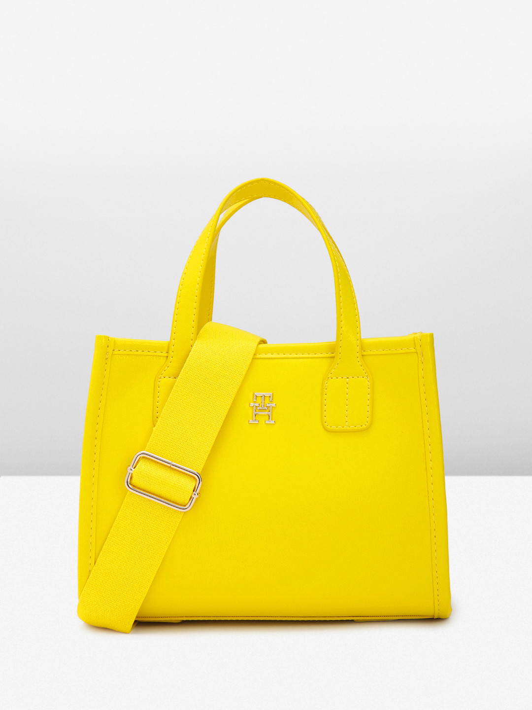 

Tommy Hilfiger Women Solid Handheld Bag, Yellow