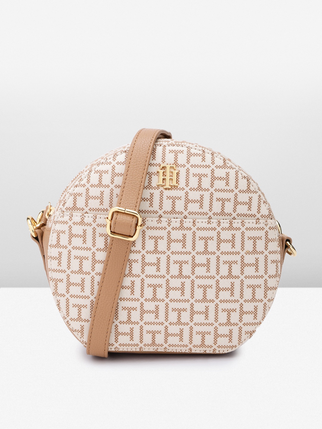 

Tommy Hilfiger Brand Logo Textured Bowling Sling Bag, Beige