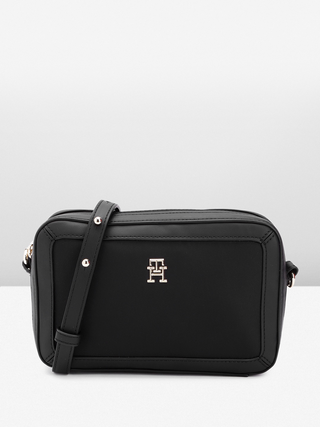 

Tommy Hilfiger Solid Structured Sling Bag, Black