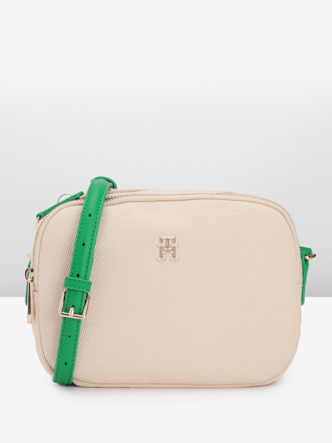 

Tommy Hilfiger Solid Structured Sling Bag, Off white
