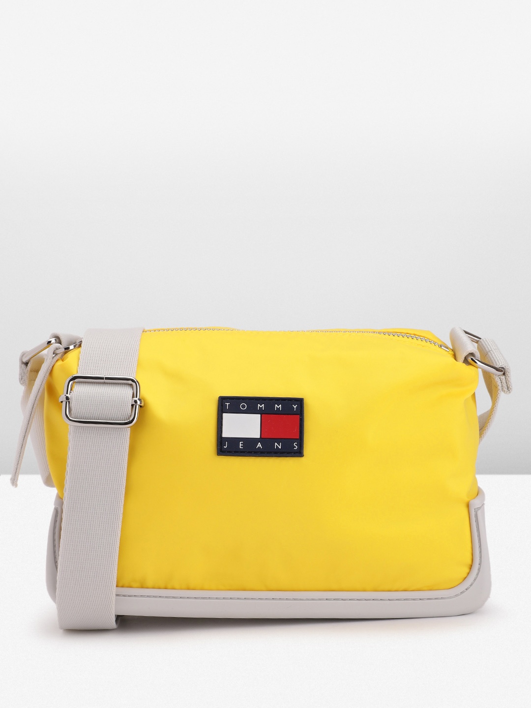 

Tommy Hilfiger Women Solid Sling Bag, Yellow