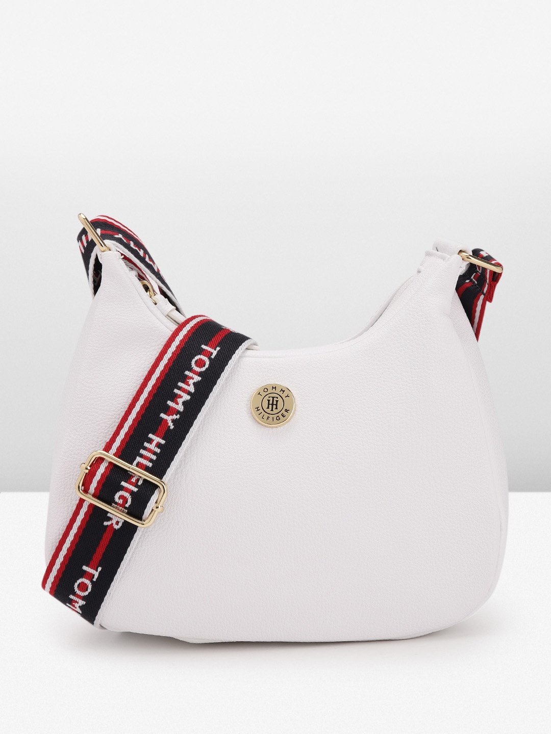 

Tommy Hilfiger Women Solid Sling Bag, White