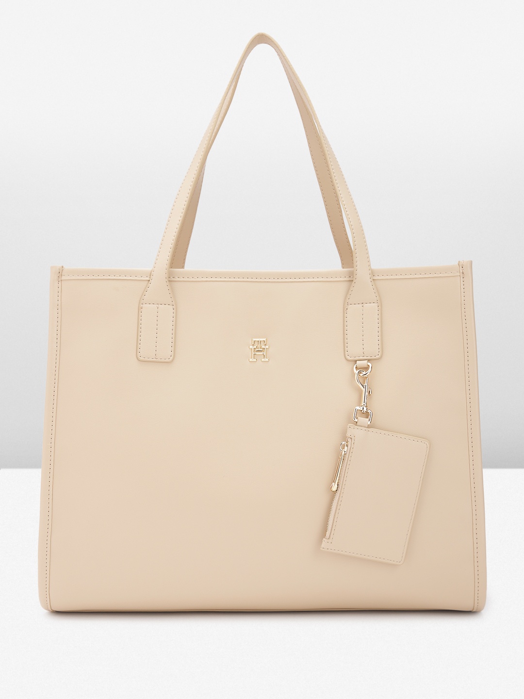

Tommy Hilfiger Women Solid Handheld Bag, Cream