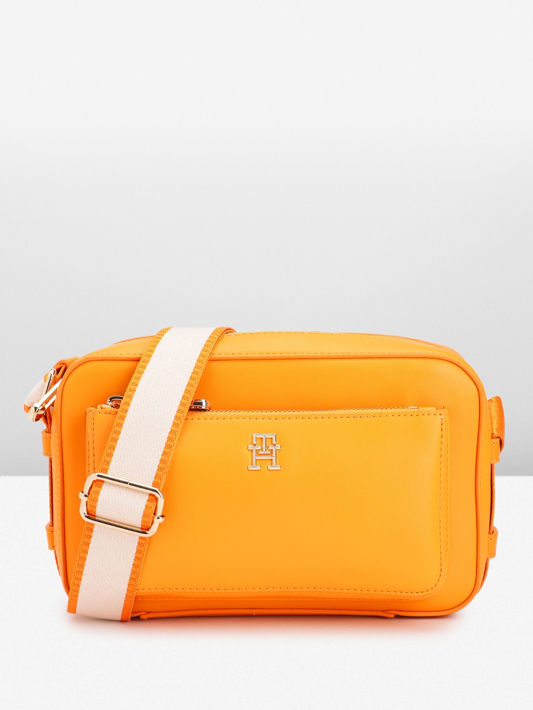

Tommy Hilfiger Women Solid Sling Bag, Orange