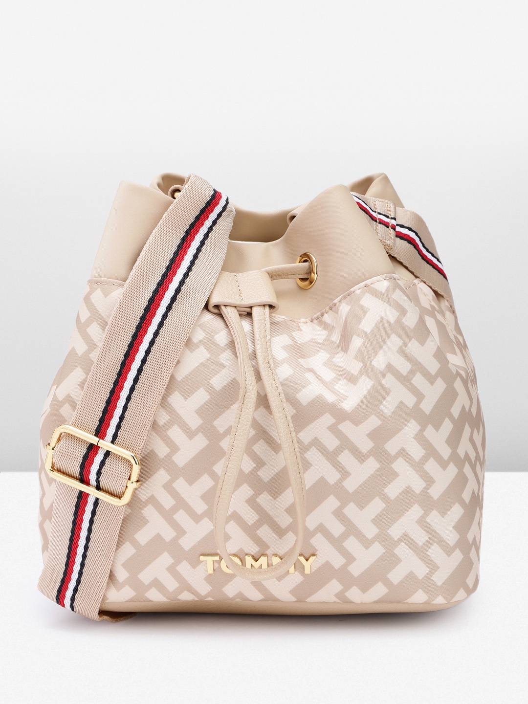 

Tommy Hilfiger Brand Logo Print Structured Sling Bag, Beige