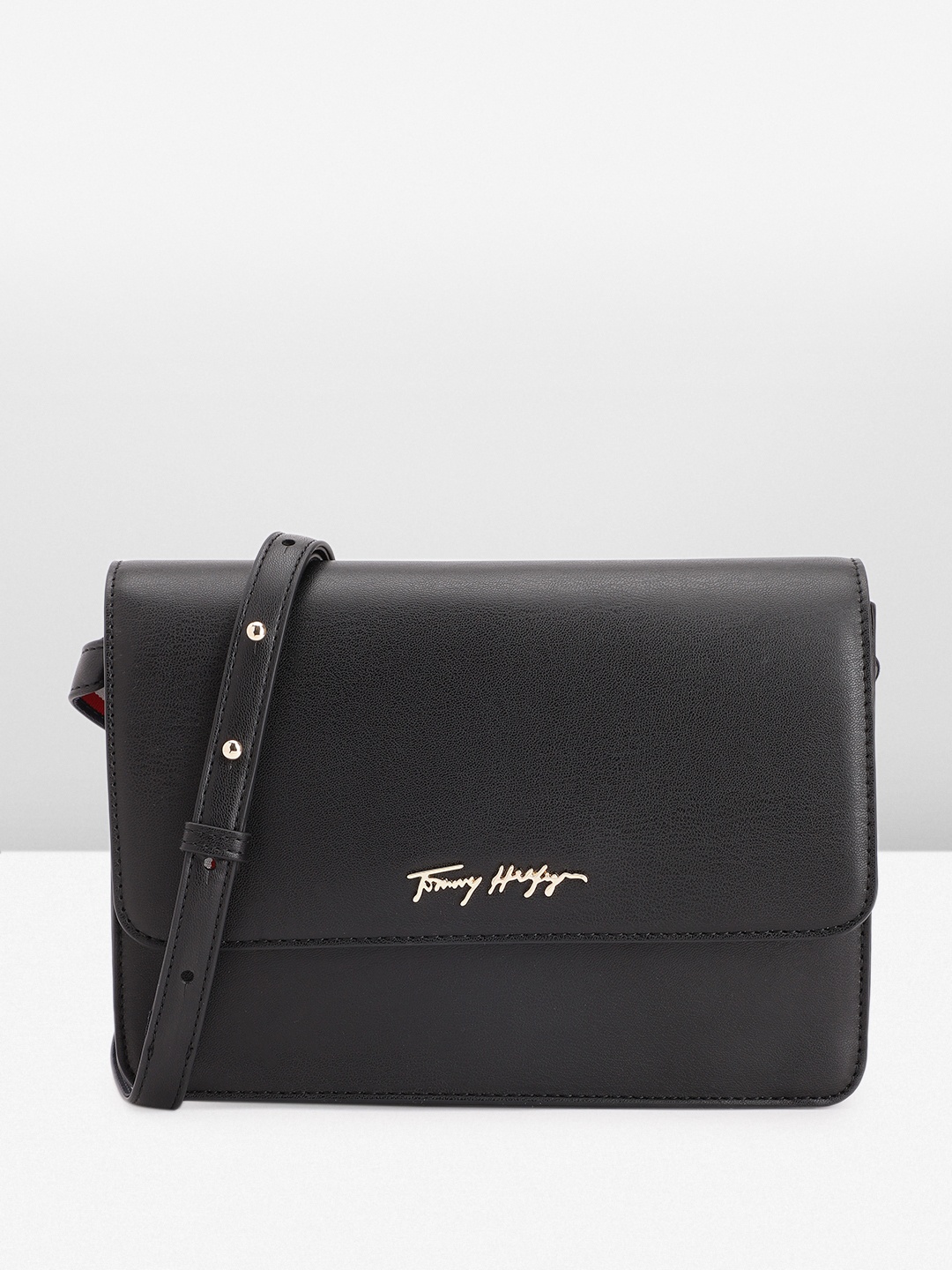 

Tommy Hilfiger Women Solid Sling Bag, Black