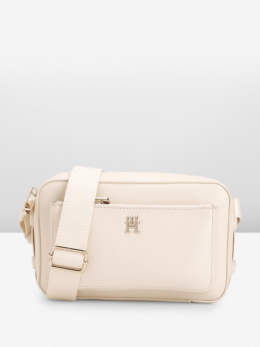 

Tommy Hilfiger Solid Structured Sling Bag, Off white