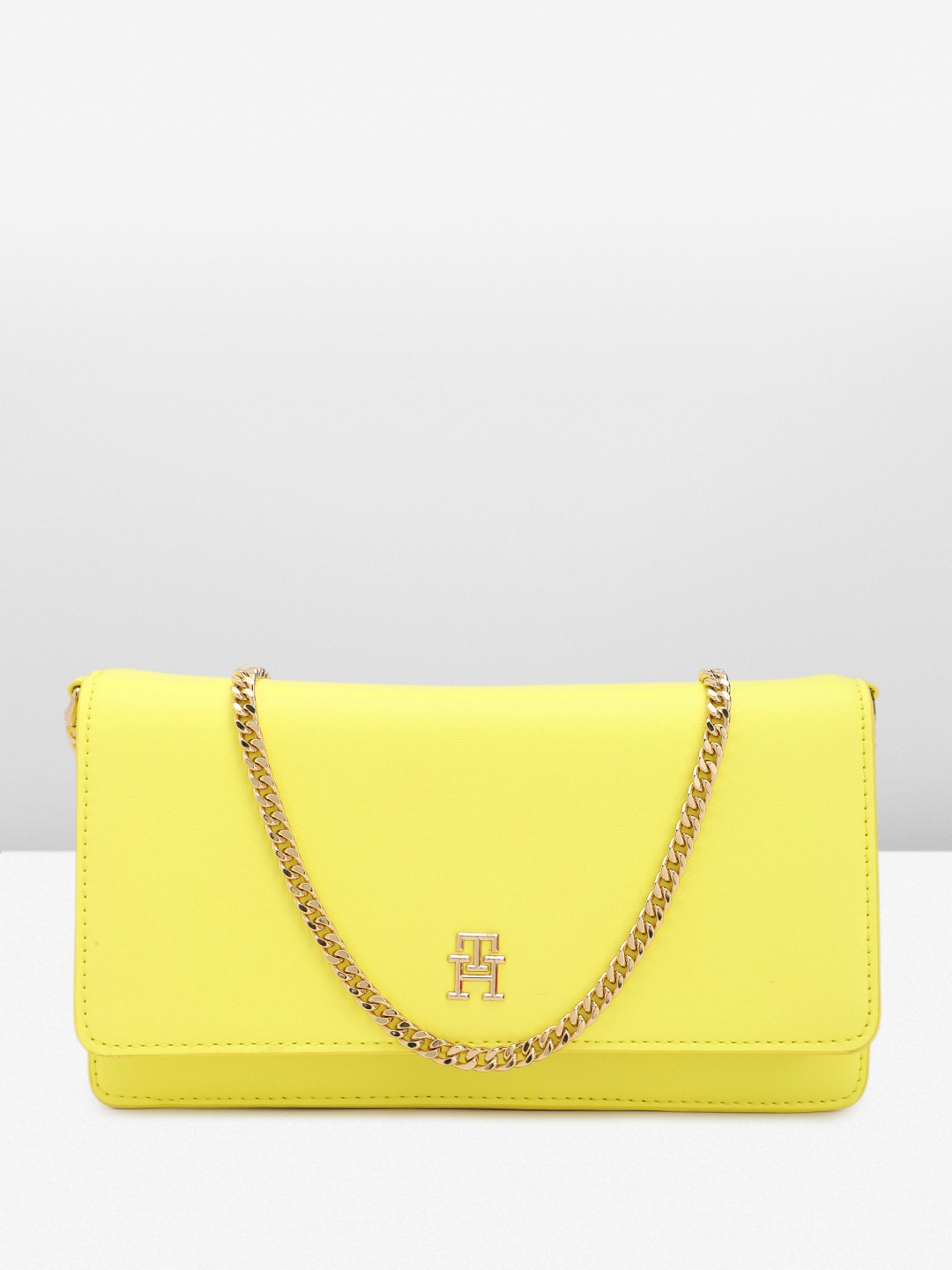 

Tommy Hilfiger Women Solid Sling Bag, Yellow