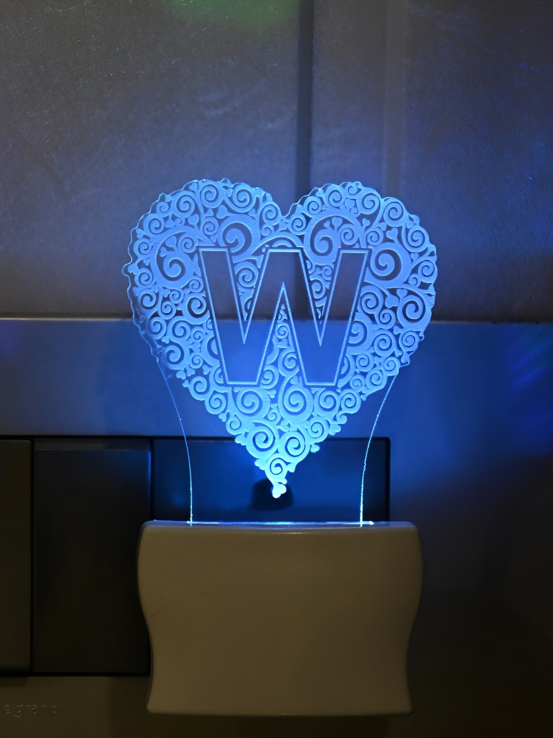 

Afast Transparent & Blue Textured Acrylic Contemporary Wall Lamp
