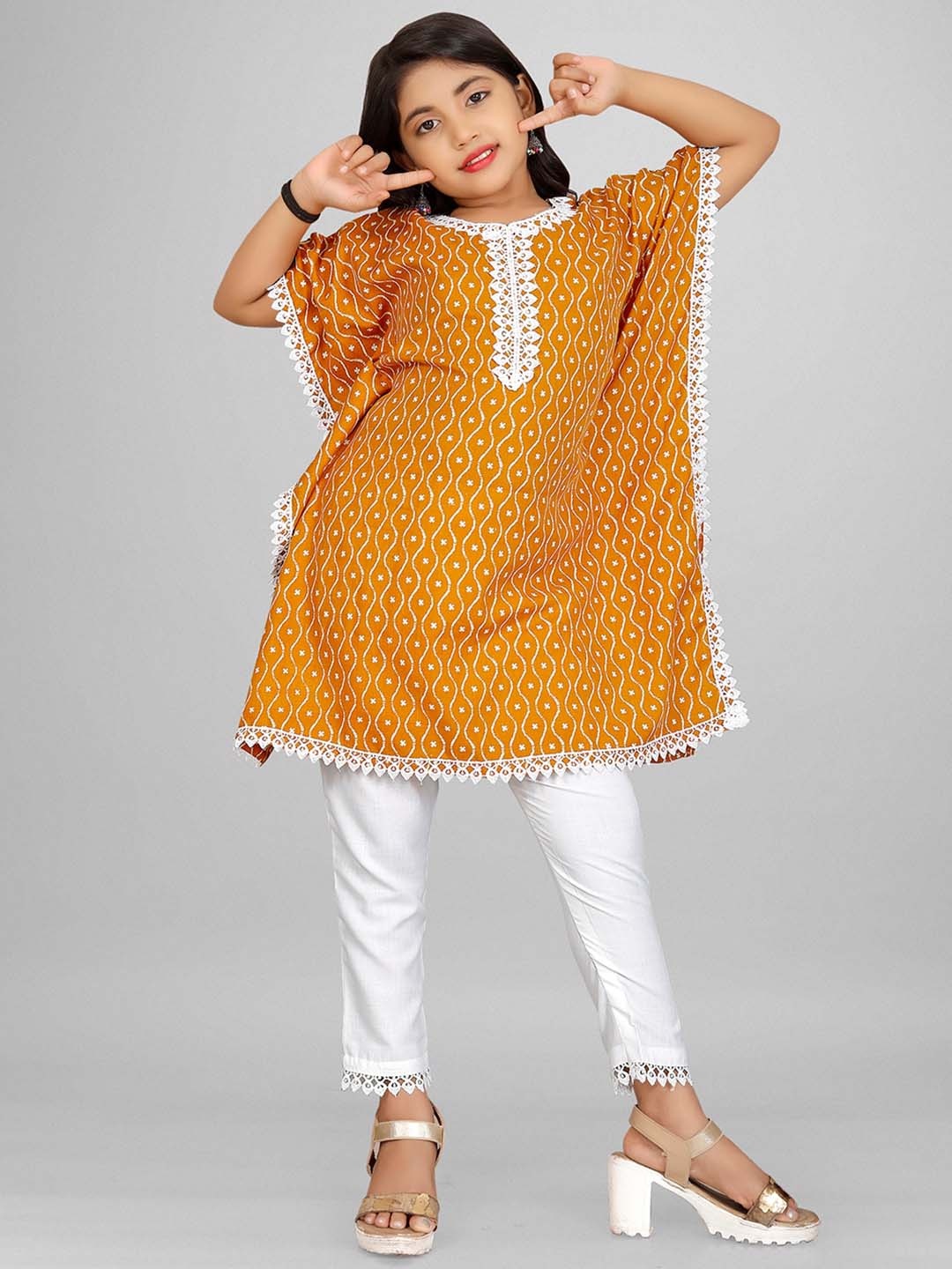 

BAESD Girls Mustard Yellow Ethnic Motifs Printed Regular Kurta with Trousers