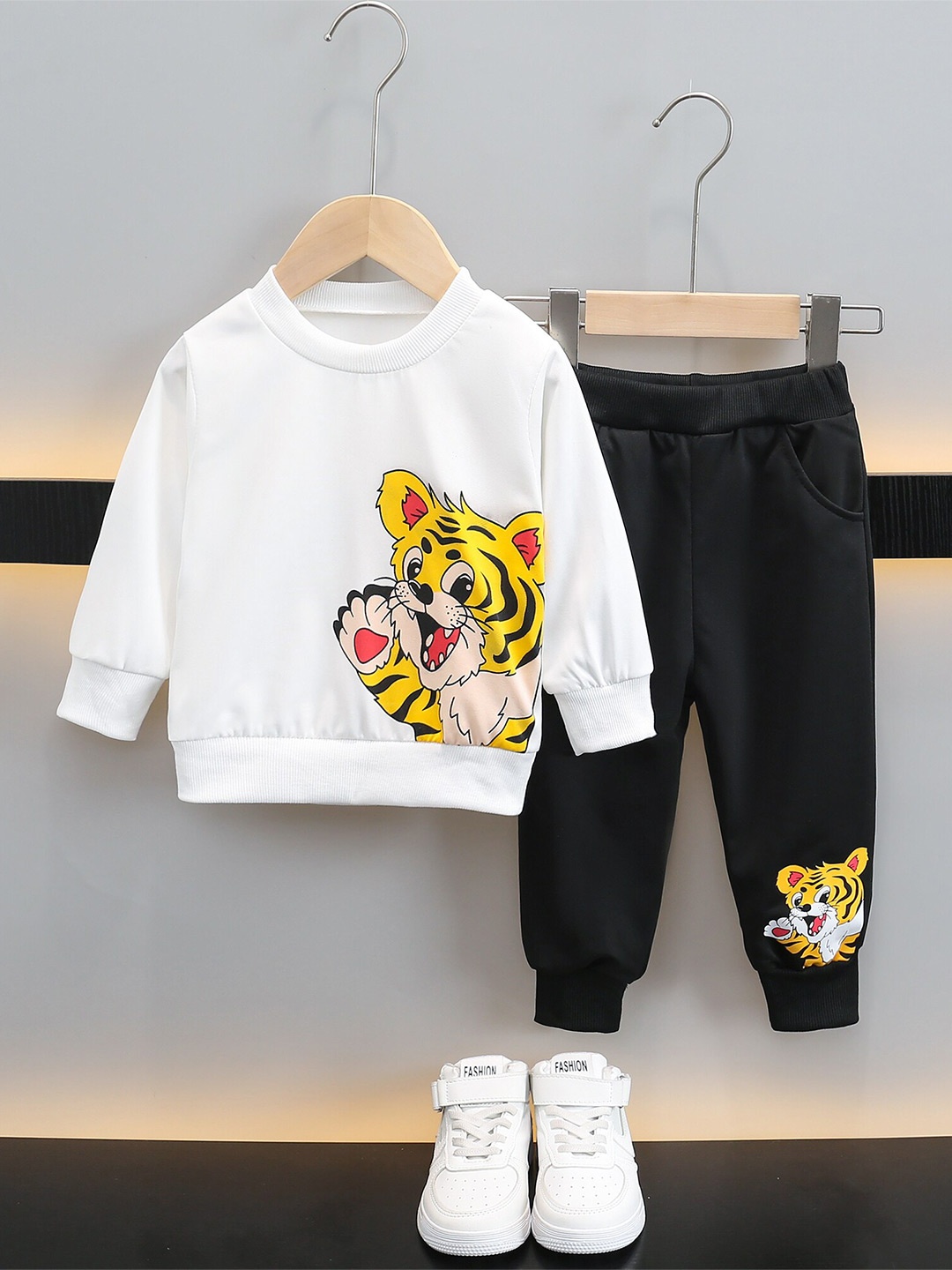 

StyleCast Boys White & Black Printed T-shirt with Trousers