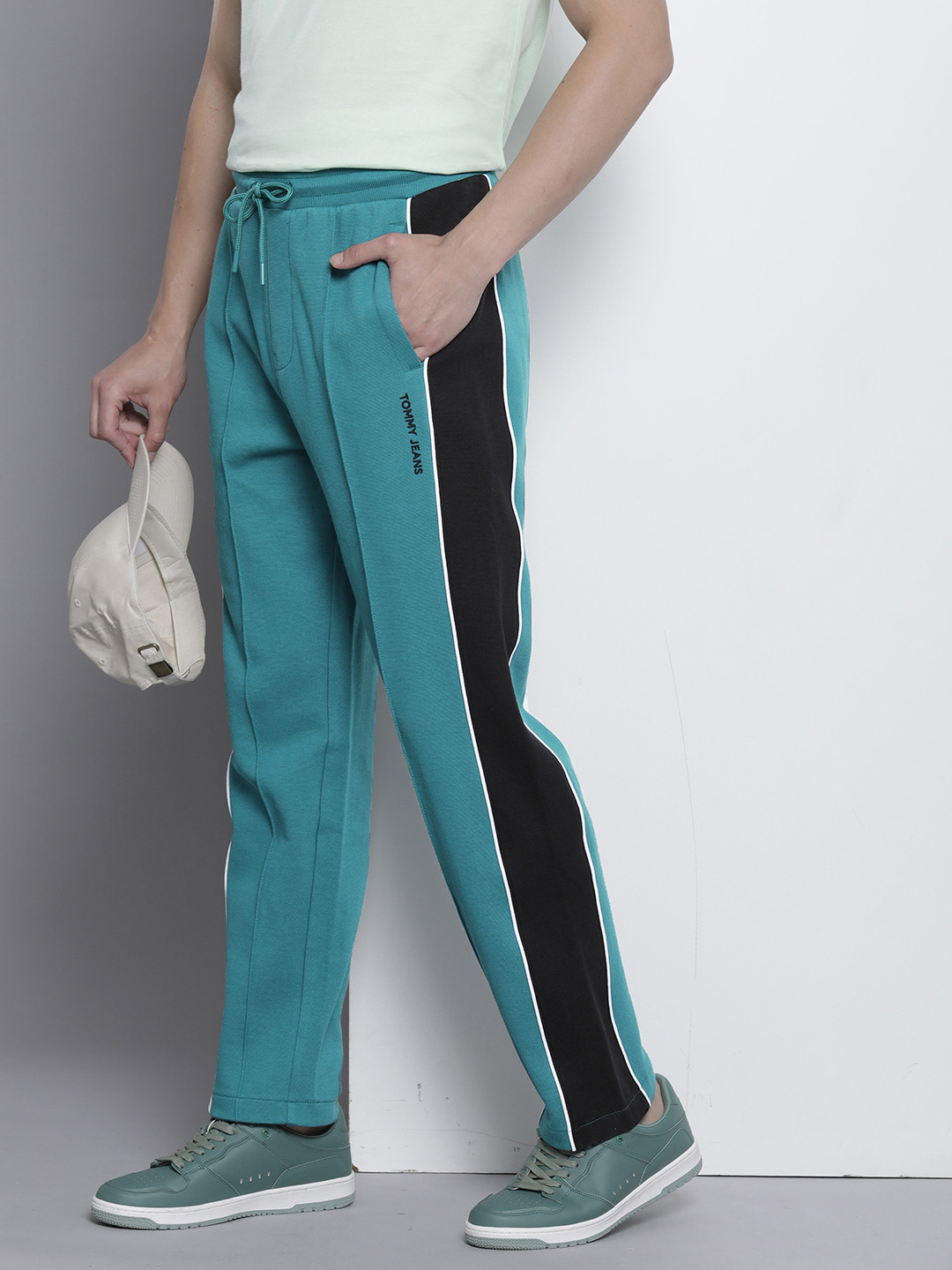 

Tommy Hilfiger Men Pure Cotton Colourblocked Relaxed Fit Mid-Rise Track Pants, Teal