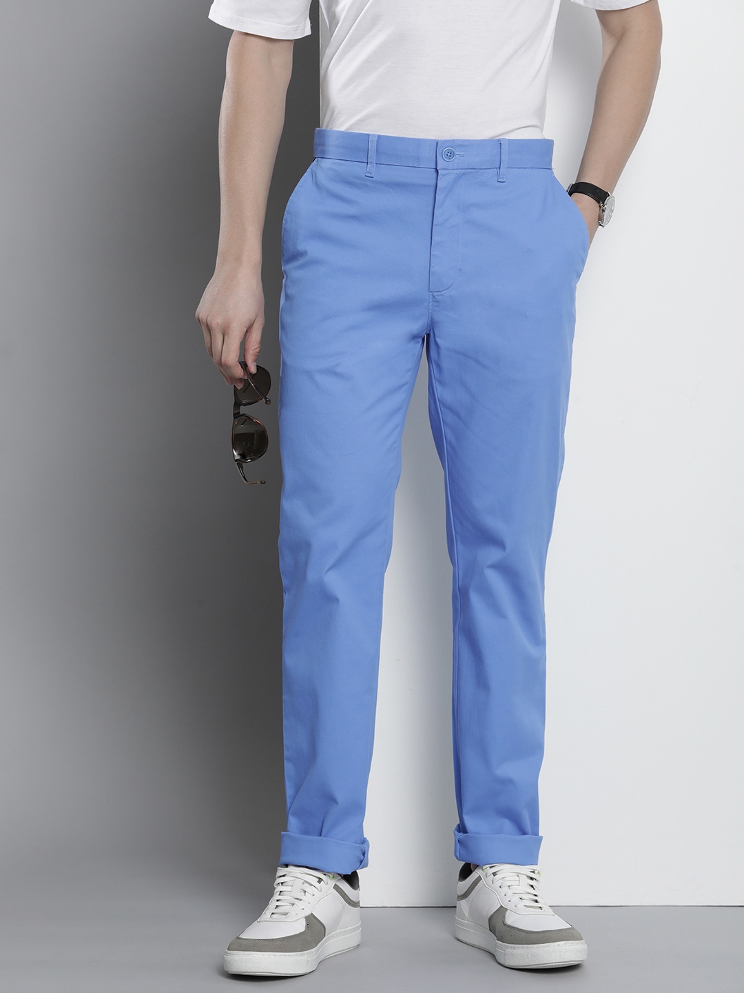 

Tommy Hilfiger Men Solid Mid-Rise Chinos, Blue